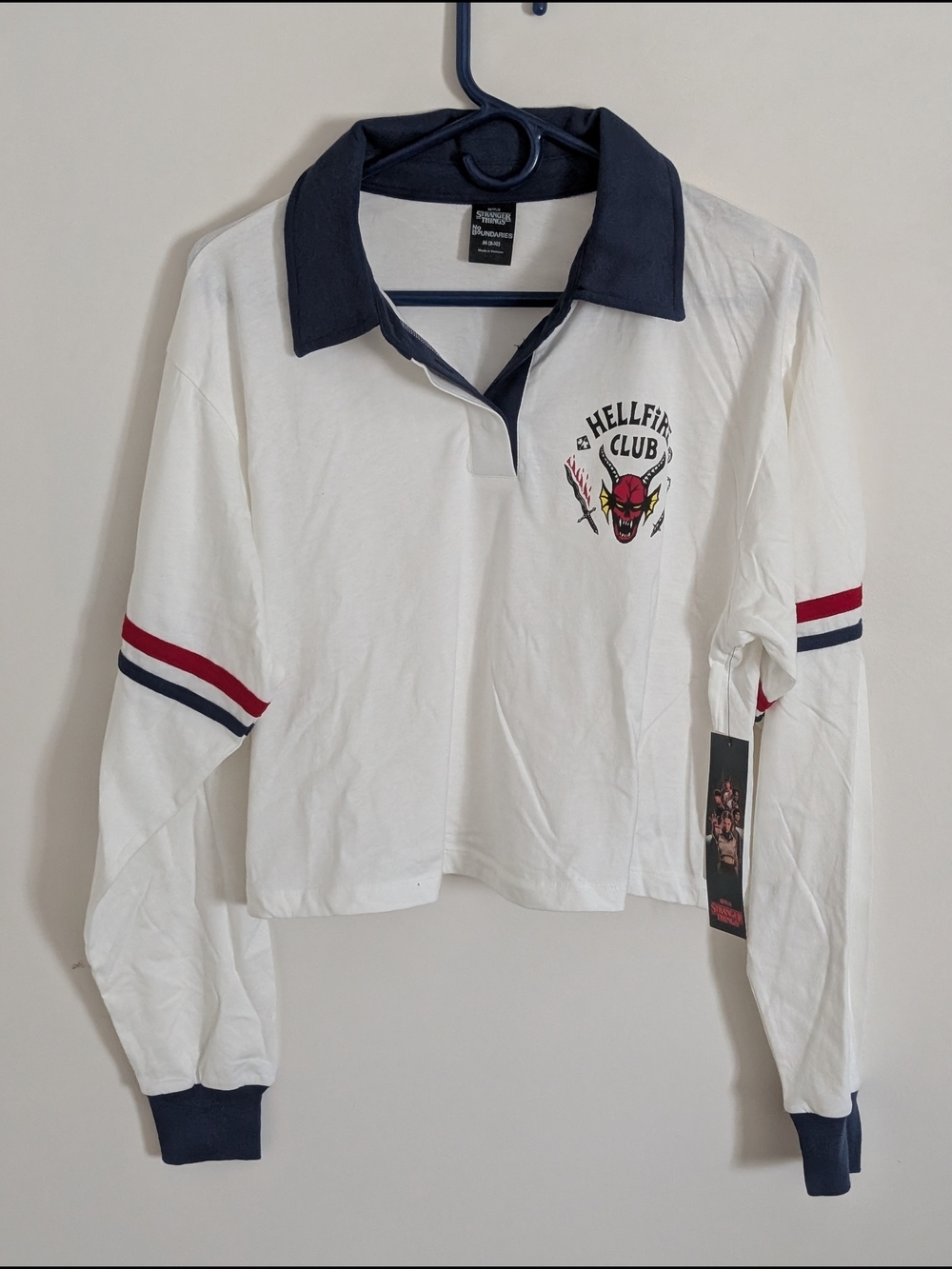 Netflix White Rugby Shirt with Navy Collar & Red/ Navy Sleeve Stripes